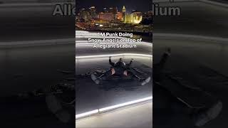 CM PUNK Doing Snow Angels On Top Of ALLEGIANT STADIUM #wwe #cmpunk #wrestlemania #fyp