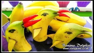 Art In Banana Show - Fruit Carving Yellow Dolphins Garnish