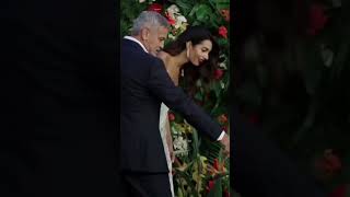 Amal Clooney And George Clooney Admire Julia Robers Dress At The Premiere