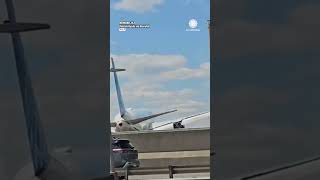 This truck driver had NO idea a plane was coming!