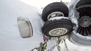 United Express jet lands between runway and taxiway, destroying plane