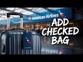 How To Add Checked Bag on American Airlines - quick guide