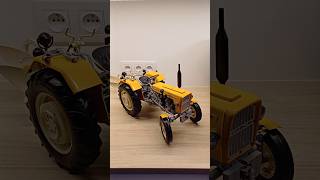 Ursus 1:18 C-330 Deagostini z pługiem.