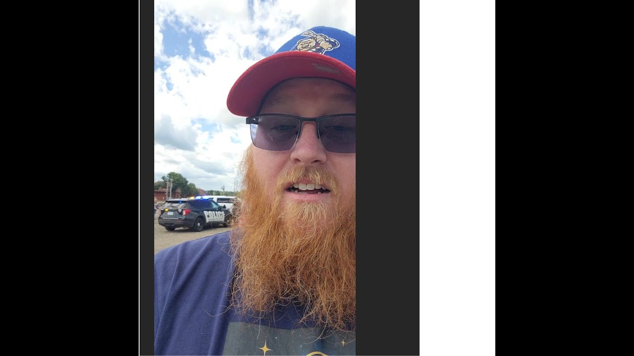 Cops swarm as we pull in to serve the homeless. Bruce was beaten and robbed.