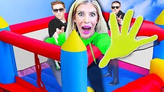 LAST TO LEAVE Bounce House on Roof Wins $10,000! (Game Master Challenge) | Rebecca Zamolo