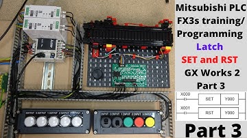 Mitsubishi PLC FX3s training rig / programming, Latch, SET and RST GX Works 2. Part 3 (English)