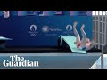 Diver slips during Olympic pool inauguration ceremony