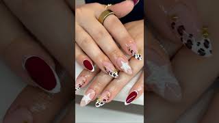 Bold Leopard Print and Star Nail Art - The Power of Animal Print in Nail Design