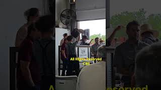 Clucking Auctioneer with the Amish selling restaurant equipment