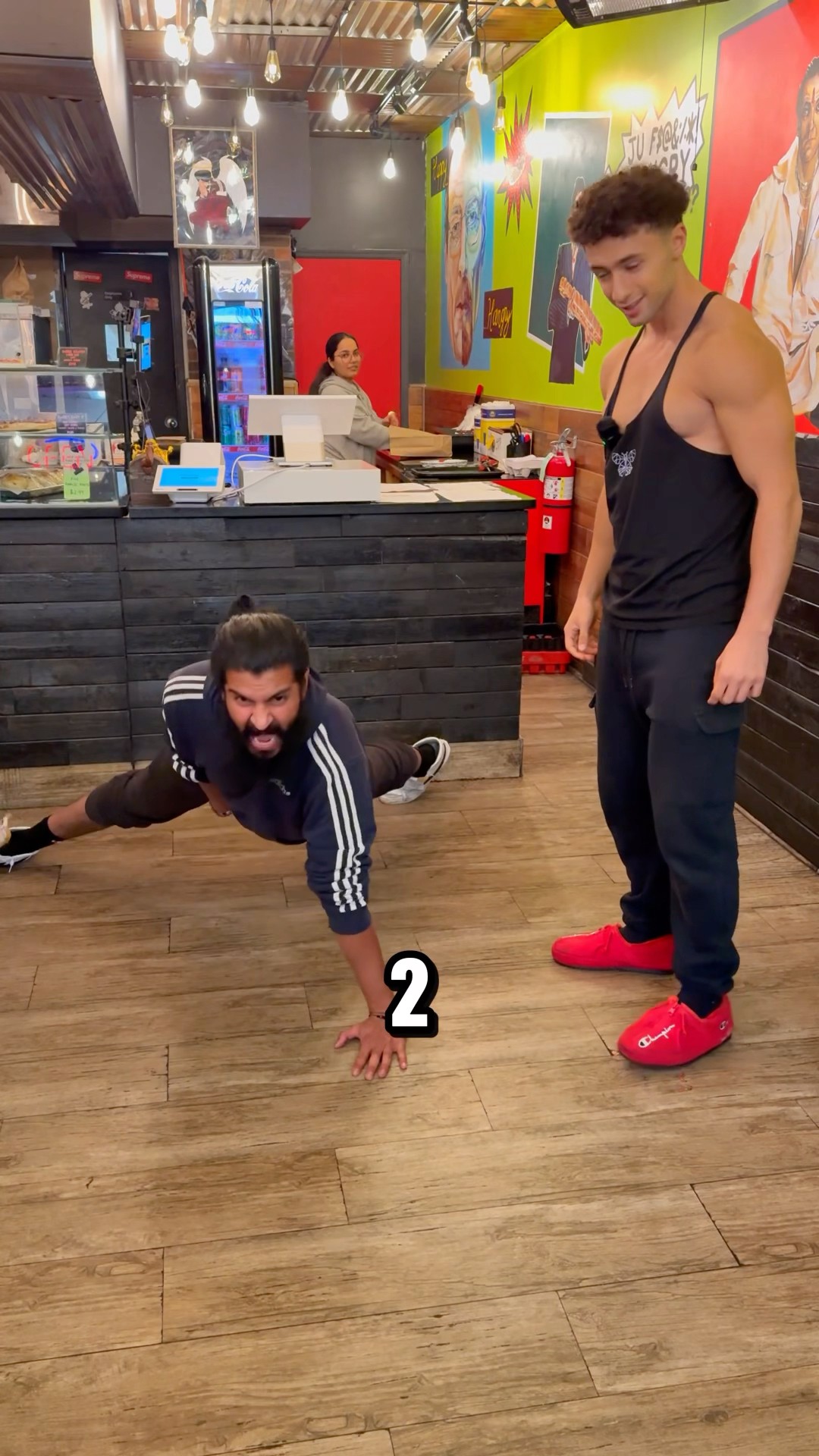 I made the owner do pushups for his own food?