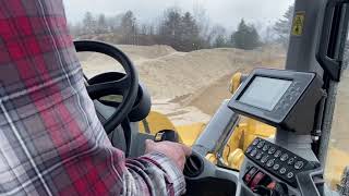 Loading a truck in our new CAT 938M