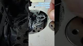 single needle retiming rotating hook