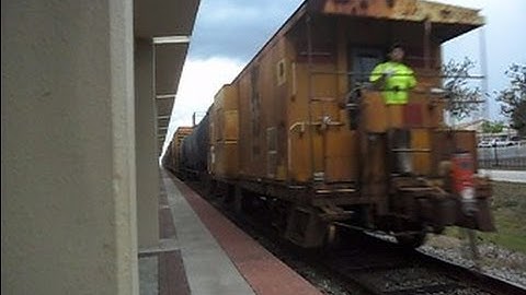 CSX Train In High Speed Reverse With Caboose