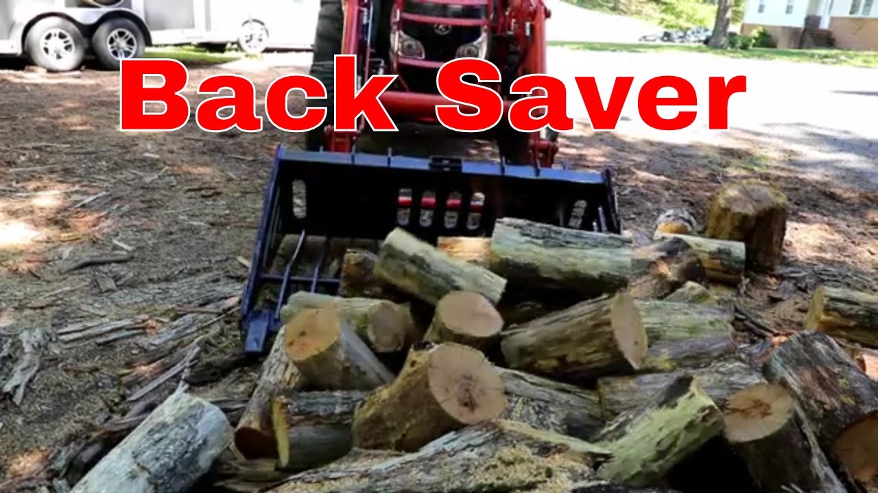 Using a Rock Bucket to Move Rounds and Splits With a Compact Tractor