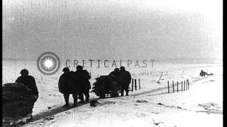 Soldiers walk towards the Fort Douaumont in Verdun, France. HD Stock Footage