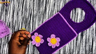 Crochet phone holder on wall charger