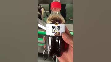 Automatic labeling machine for soda drink bottles