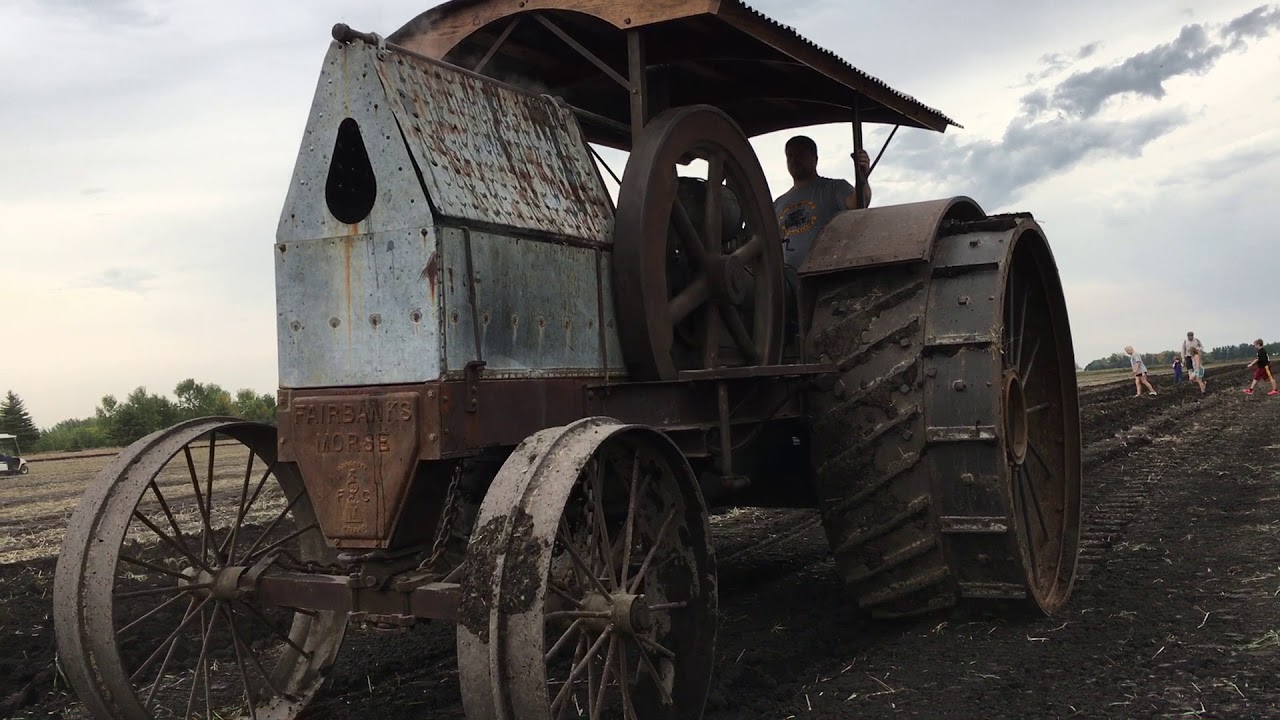 Fairbanks Morse single cylinder antique tractor plowing