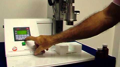 Automatic cap removal system