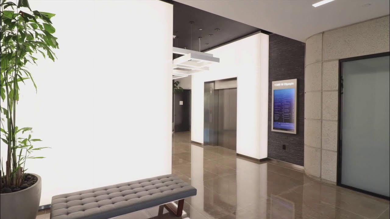 Backlit Glass Walls 11300 W Olympic Lobby Los Angeles, CA Custom