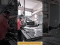 Metal machining: Factory worker operate milling machine, shape parts, and ensure precision