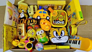 Box Full of Yellow Toys🥰Lunch Box, Piggybank, Spinner, Piano , Geometry, Pokemon Card, Sharpener etc