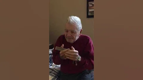 Dad playing harmonica