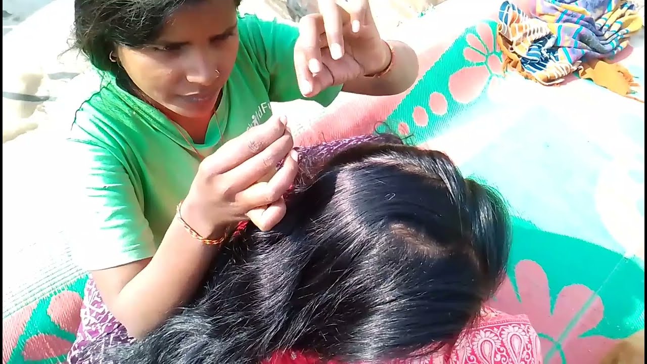 nits picking in my aunty long hair