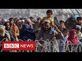 Thousands of Afghans flee to Pakistan following Taliban victory - BBC News