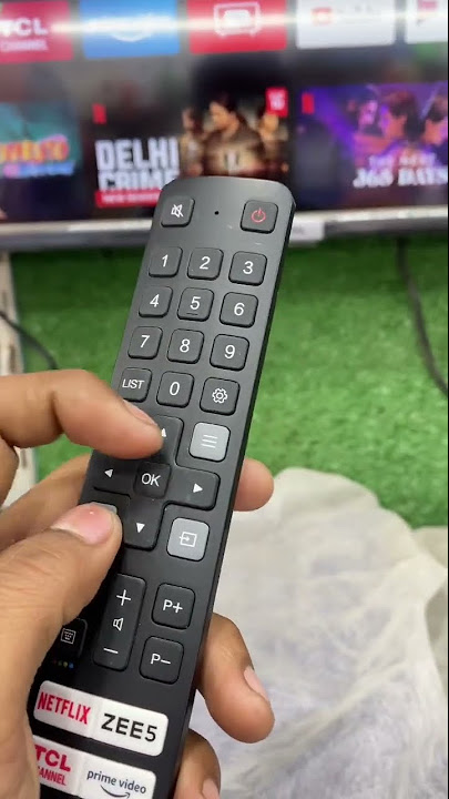 Где находится кнопка сопряжения на пульте TCL Remote