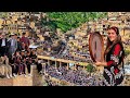 Dance and singing ceremony of  hezar daf  in palangan village of iran 