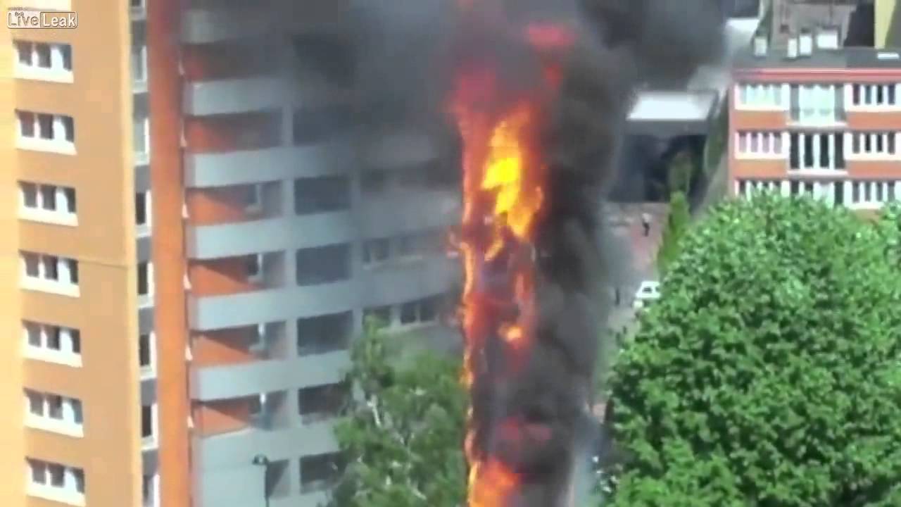 Fire Engulfs The Entire Side Of A High Rise Building Youtube
