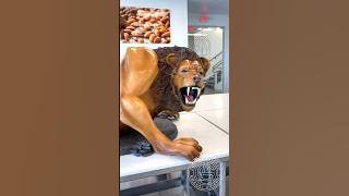 The Chocolate Lion! 🦁 This one is massive! 6ft talk for 180lb of chocolate. #amauryguichon #lion