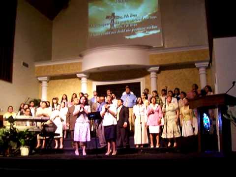 Choir sings "He Lives"
