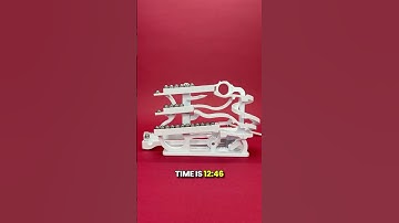 The Tipping Marble Clock