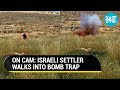 Instant karma israeli settler kicks palestinian flag rigged with explosives