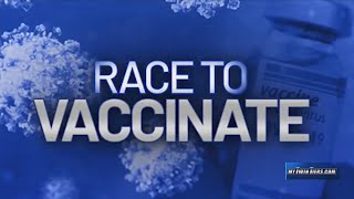 CDC director approves booster shot for frontline workers
