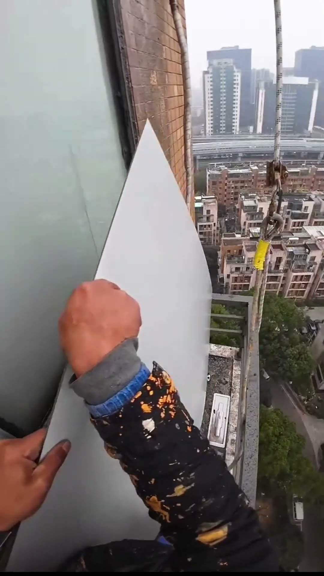 The tall building removed the burst glass