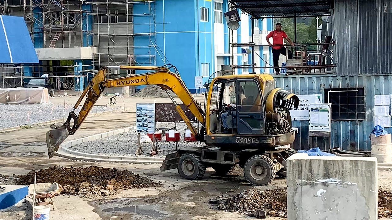 Mini Excavator Hyundai 55W-9A Trenching for New Electrical Work - Peusangan Hydroelectric