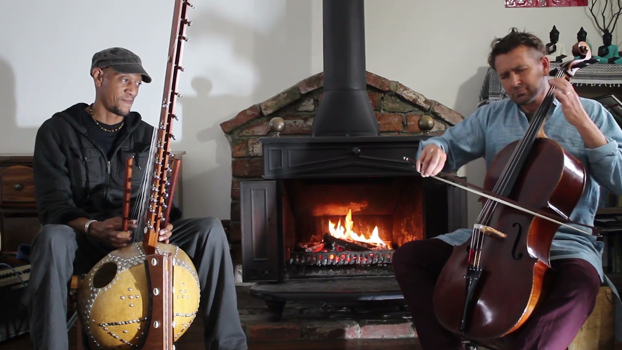 Peter performing Sunrise with kora and cello