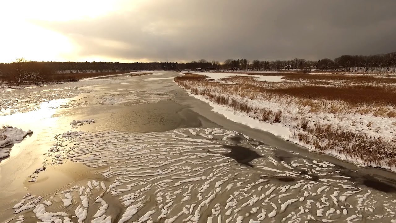 Drone view of Upstate NY frozen Salmon River's spectacular ice patterns