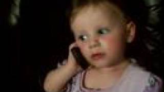 baby talking to dad on phone funny girl