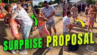 Guy Proposes to a Girl as People Cheer