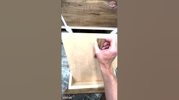 Impressive secret drawer compartment in a storage console