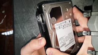 How to install a hard drive in a tool-less drive sled