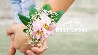 Simple and modern wrist corsage for your special day using a hair tie!
one pack of 20 ties cost $2.50 but if you went the traditional route,
each bracel...