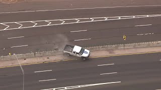 Truck flips during police chase