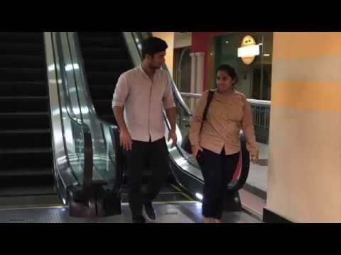 touching-strangers-hands-on-escalator-|-prank-in-india