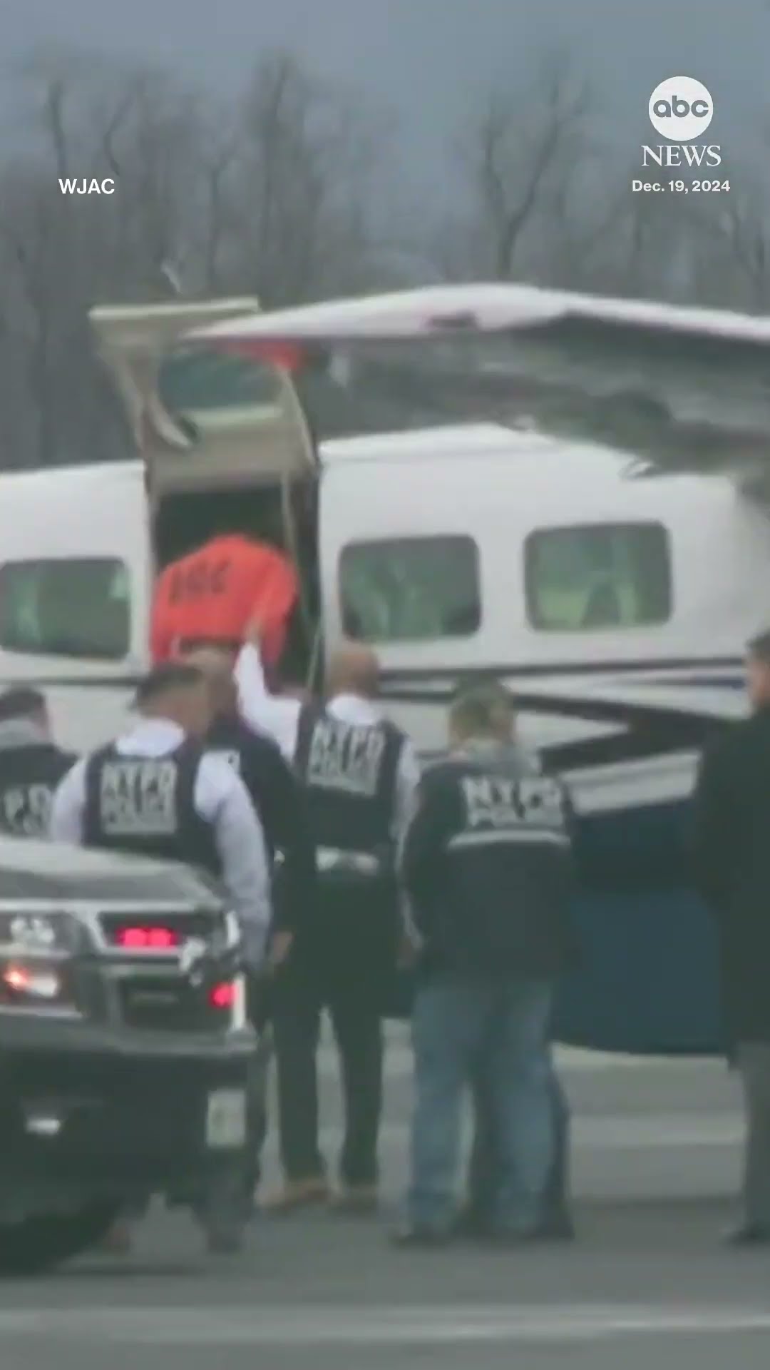 UnitedHealthcare CEO shooting suspect Luigi Mangione boards a plane en route to New York City