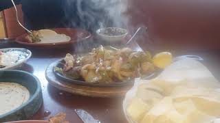 FAJITAS FOR DINNER TONIGHT AT CARLITO'S RESTAURANT. BETTY AND I SHARE FAJITAS WITH MARGARITAS.